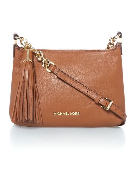 brown crossbody michael kors|Michael Kors brown suede purse.